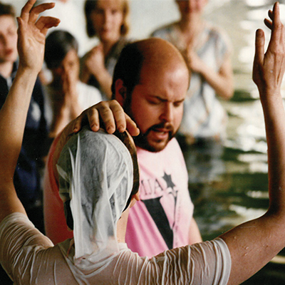 Jonathan Bernis performing baptism