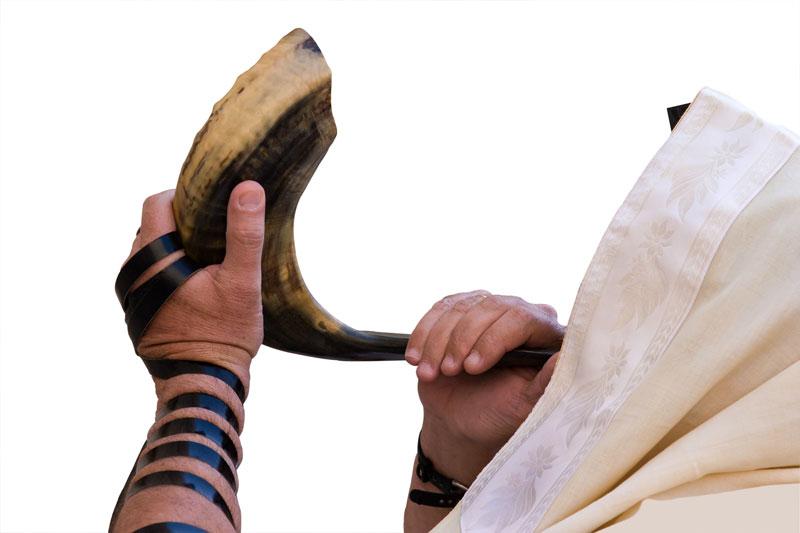 Man blowing a shofar