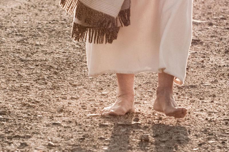 Man walking barefoot